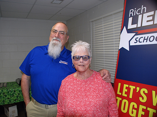 Rich standing with Marty Monts